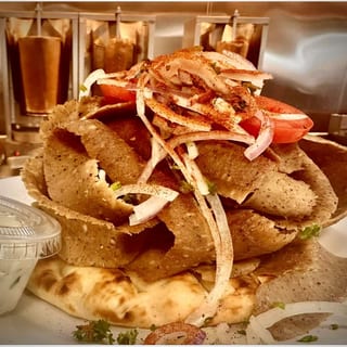 Our famous Beef and Lamb Loaded Supreme Gyro Pita (12oz Cooked Gyro Meat)