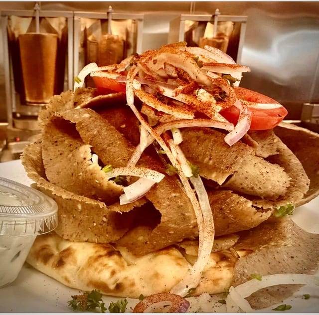 Our famous Beef and Lamb Loaded Supreme Gyro Pita (12oz Cooked Gyro Meat).
