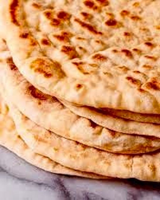 Dozen Cooked Pita Bread.