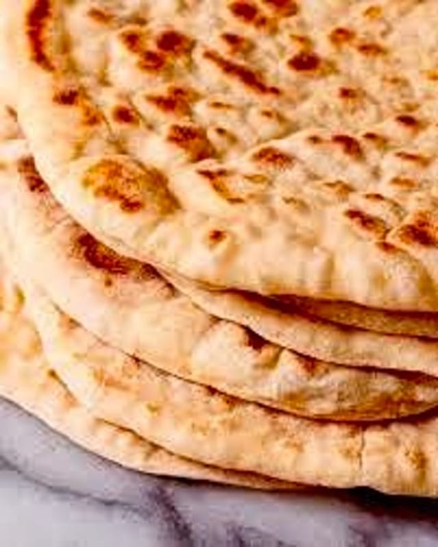 Dozen Cooked Pita Bread.